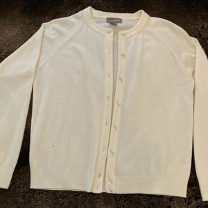 Vintage white cardigan sweater with pearl buttons.
